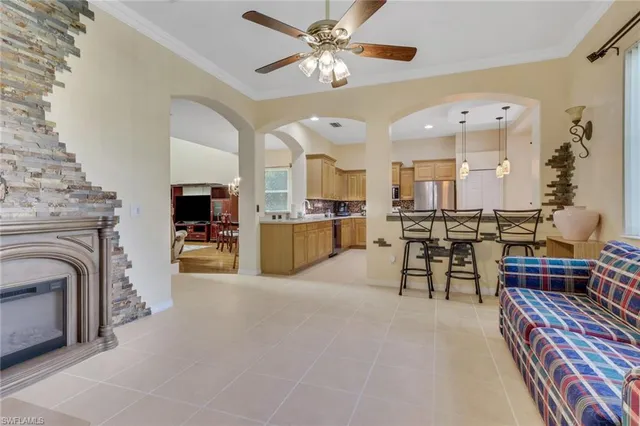 a view of a livingroom with furniture and a kitchen