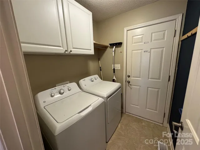 a view of storage and utility room