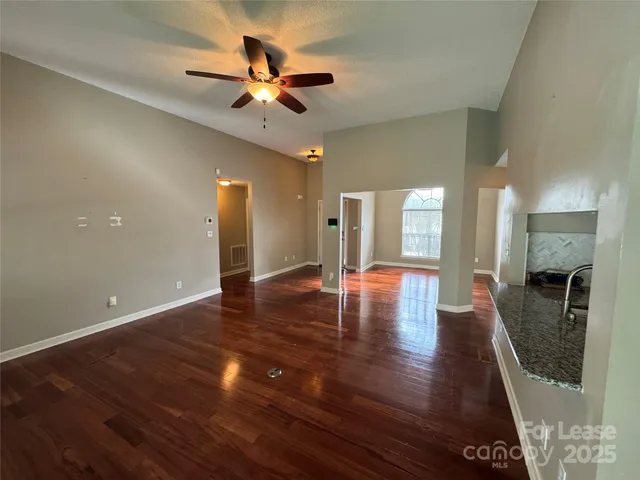 a view of a livingroom with wooden floor