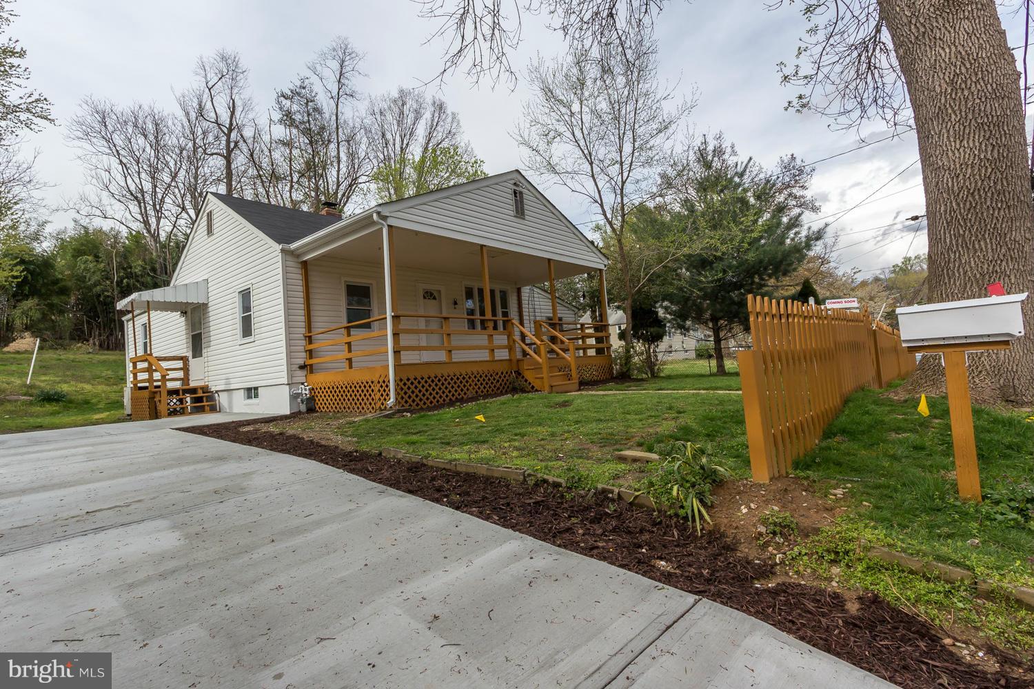 4503 Mahan Road Silver Spring, MD 20906 - Photo 2 of 25 a view of a house with yard and a garden