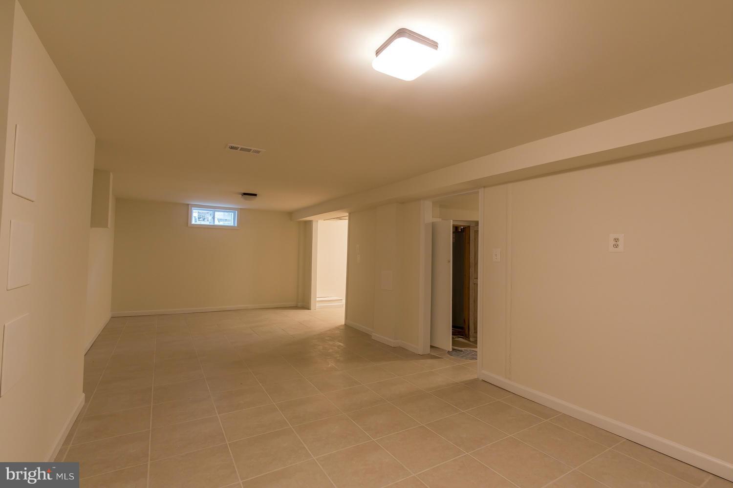 4503 Mahan Road Silver Spring, MD 20906 - Photo 21 of 25 an empty room with windows