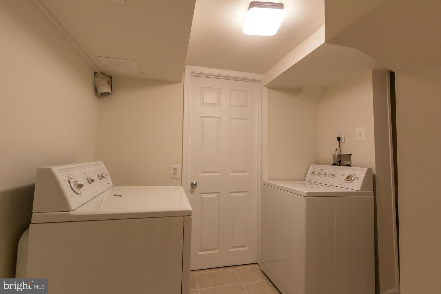 4503 Mahan Road Silver Spring, MD 20906 - Photo 23 of 25 a utility room with dryer and washer