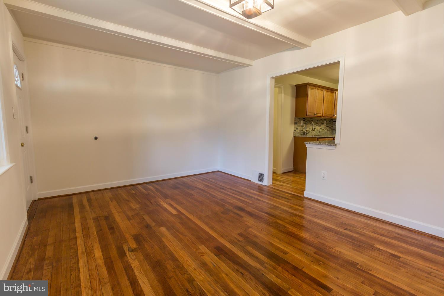4503 Mahan Road Silver Spring, MD 20906 - Photo 4 of 25 a view of empty room with wooden floor