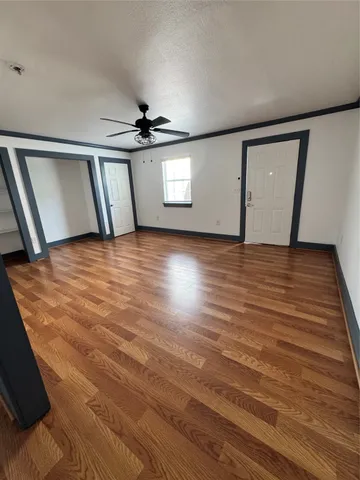 a view of a chairs and table in a room