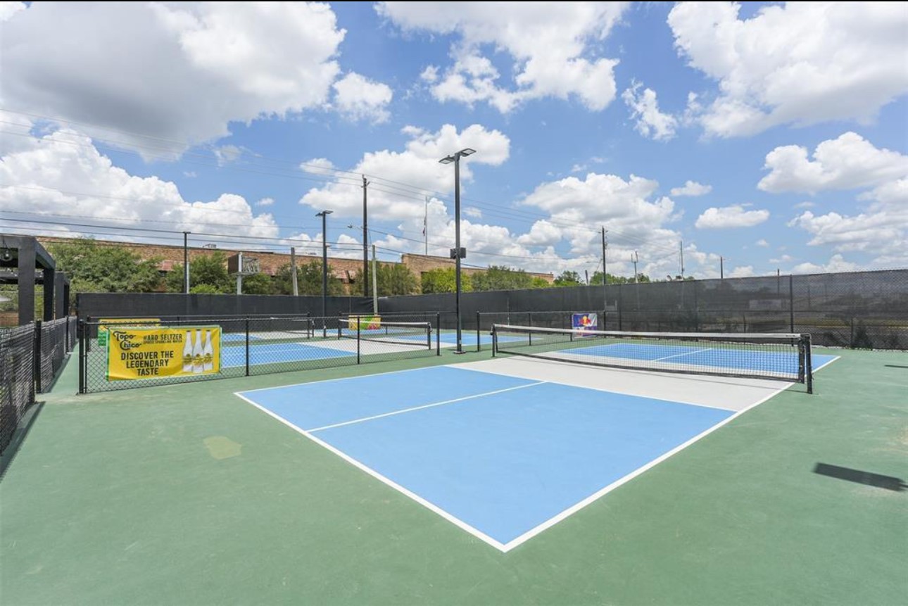 5304 Polk Street, Unit 1 Houston, TX 77023 - Photo 10 of 11 Let's play pickleball. Bumpy pickle nearby.