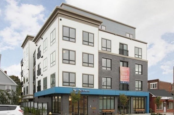 214 Market Street, Unit 301 Boston, MA 02135 - Photo 1 of 11 a front view of a multi story building