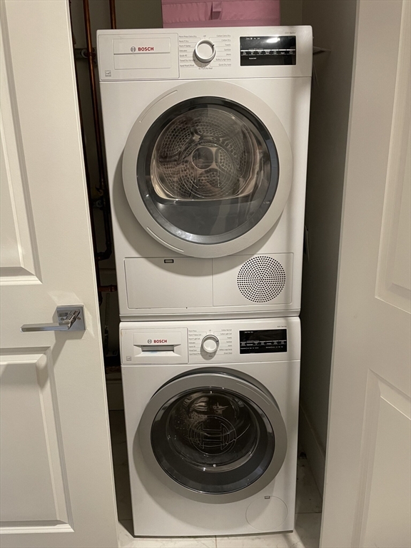 214 Market Street, Unit 301 Boston, MA 02135 - Photo 11 of 11 a utility room with dryer and washer