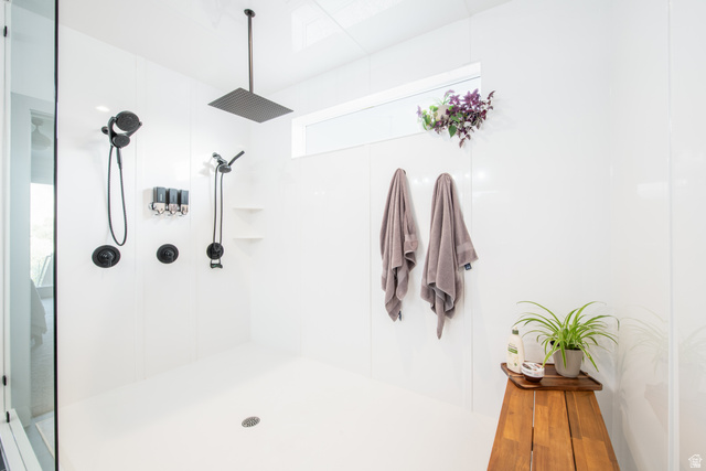 262 North Santa Fe Drive Mapleton, UT 84664 - Photo 12 of 46 Spacious shower stall with white paneling and a large rain shower head