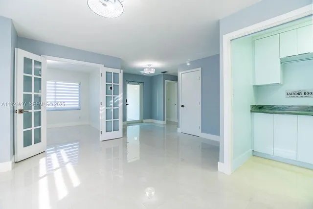 a view of livingroom with kitchen