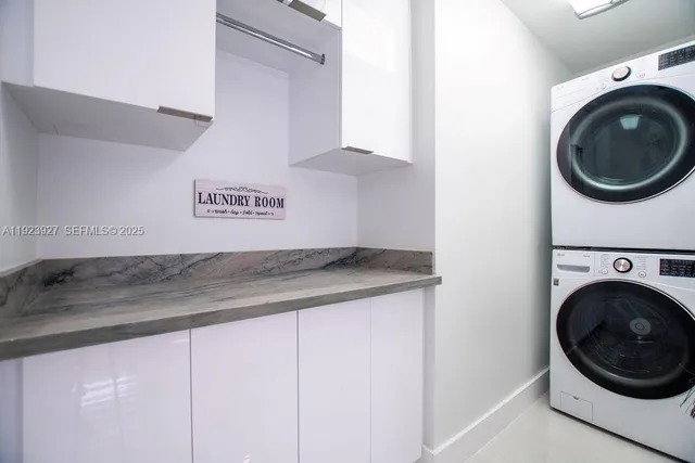 a view of a hallway with washer and dryer
