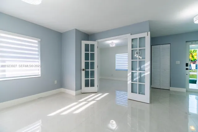 an empty room with windows