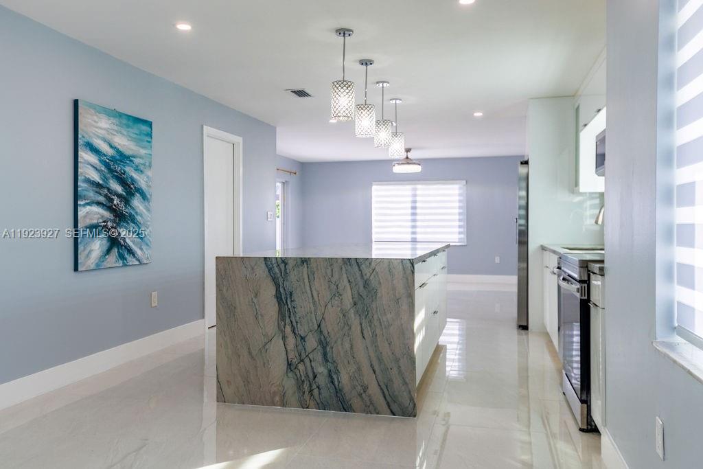 3425 Southwest 69th Avenue Miami, FL 33155 - Photo 9 of 40 a view of kitchen and windows