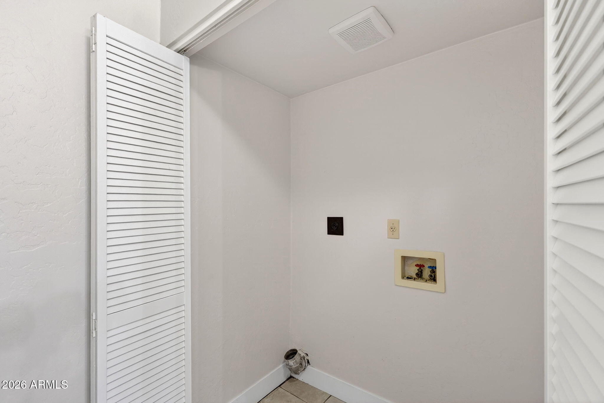 1417 East Mineral Road Gilbert, AZ 85234 - Photo 48 of 59 a white wall with a white cabinet