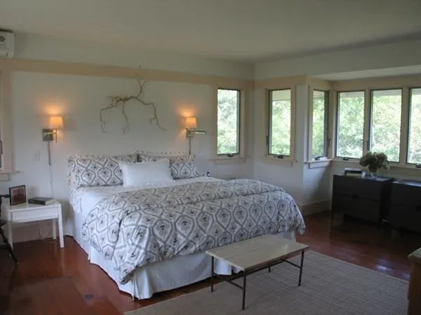 a bed room with a bed and a couch