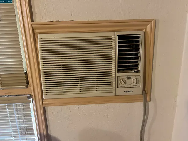 a bathroom with a shower and a sink