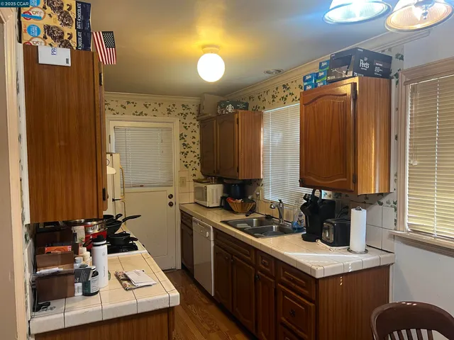 a view of backyard and entertaining space