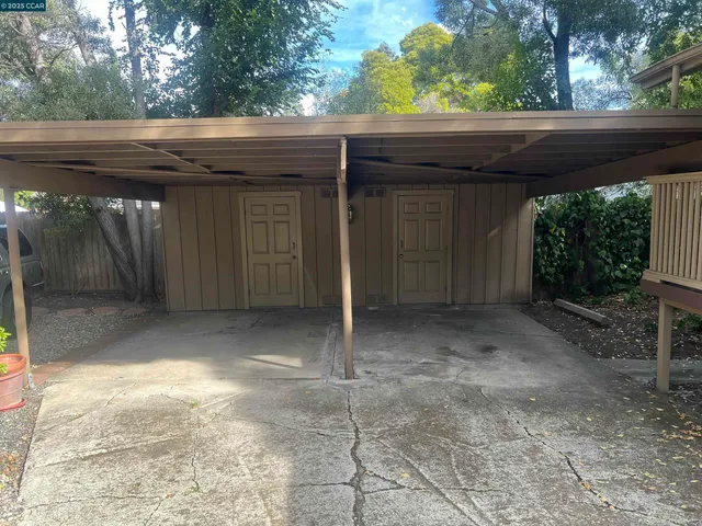 a view of a backyard of a house