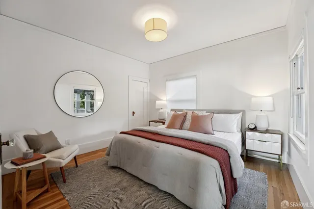 a view of hallway with wooden floor