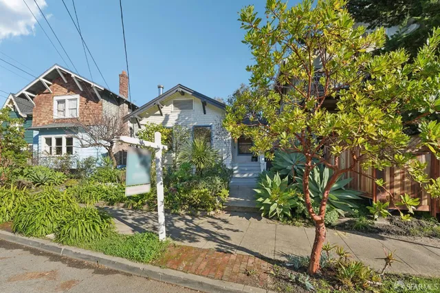 an aerial view of residential building and lake view