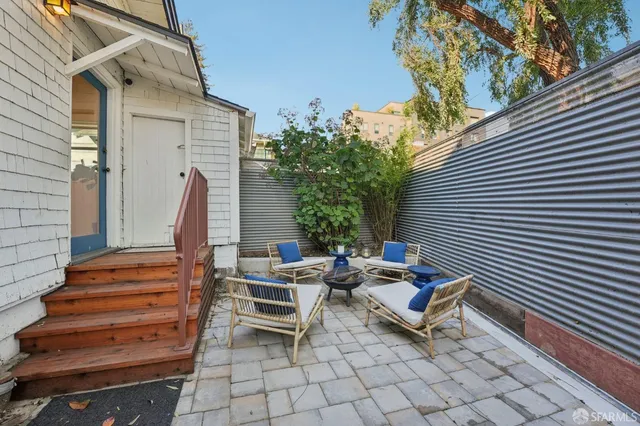 a view of a building with a street