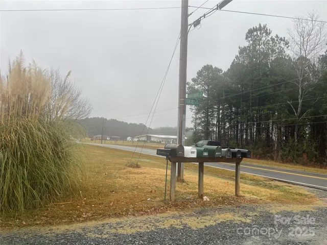 a view of a lake with a bench next to a lake