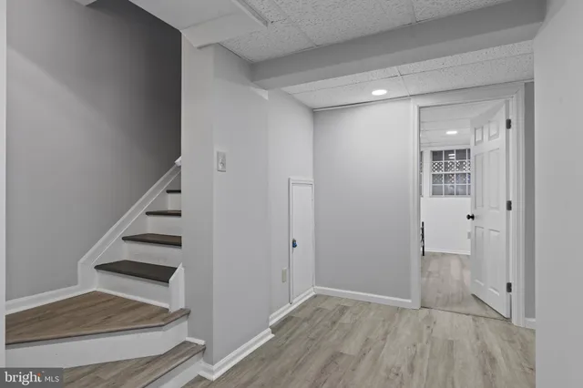 a view of entryway with wooden floor