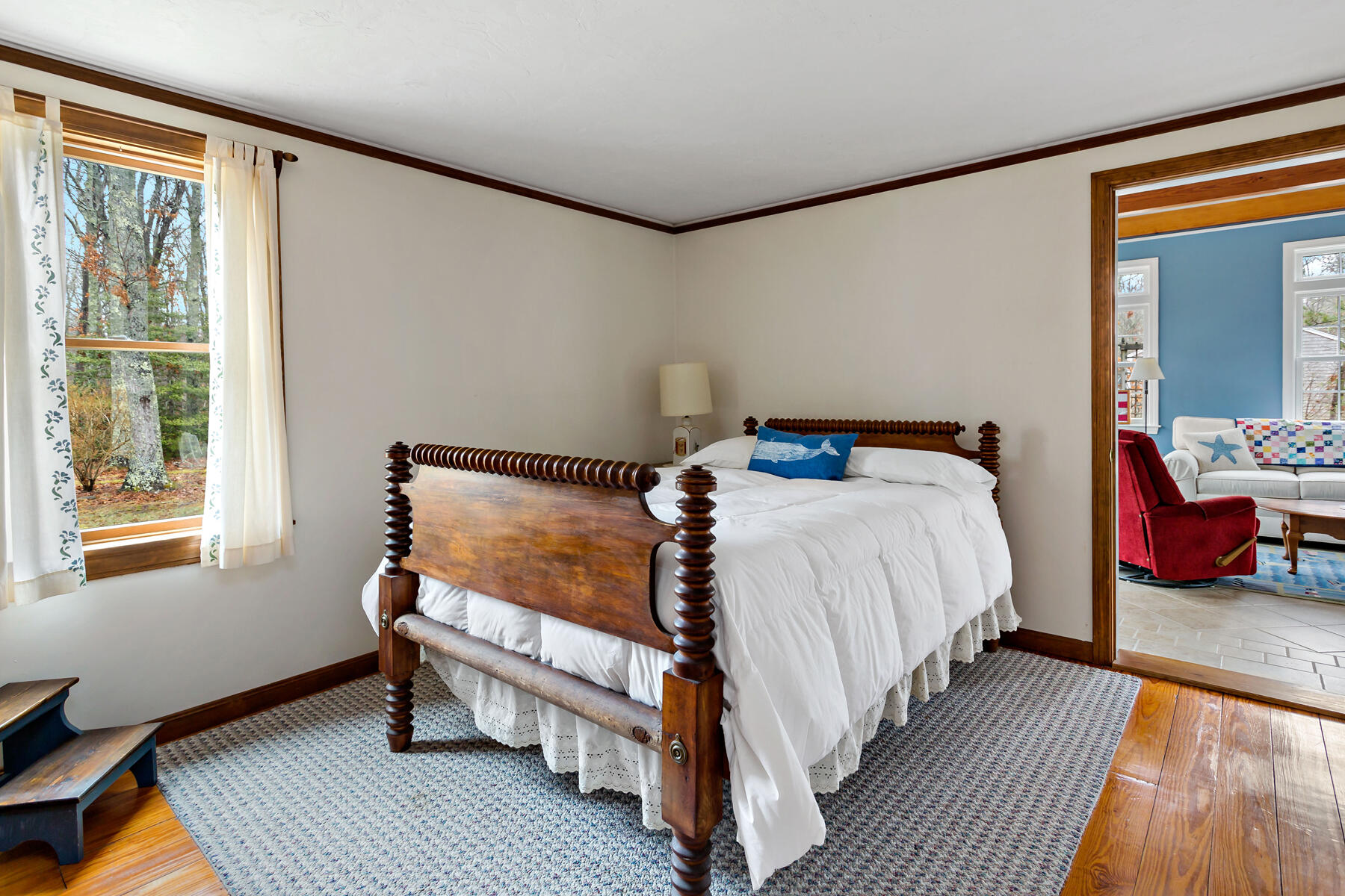 204 Farmersville Road Sandwich, MA 02563 - Photo 8 of 26 a bedroom with a bed and wooden floor