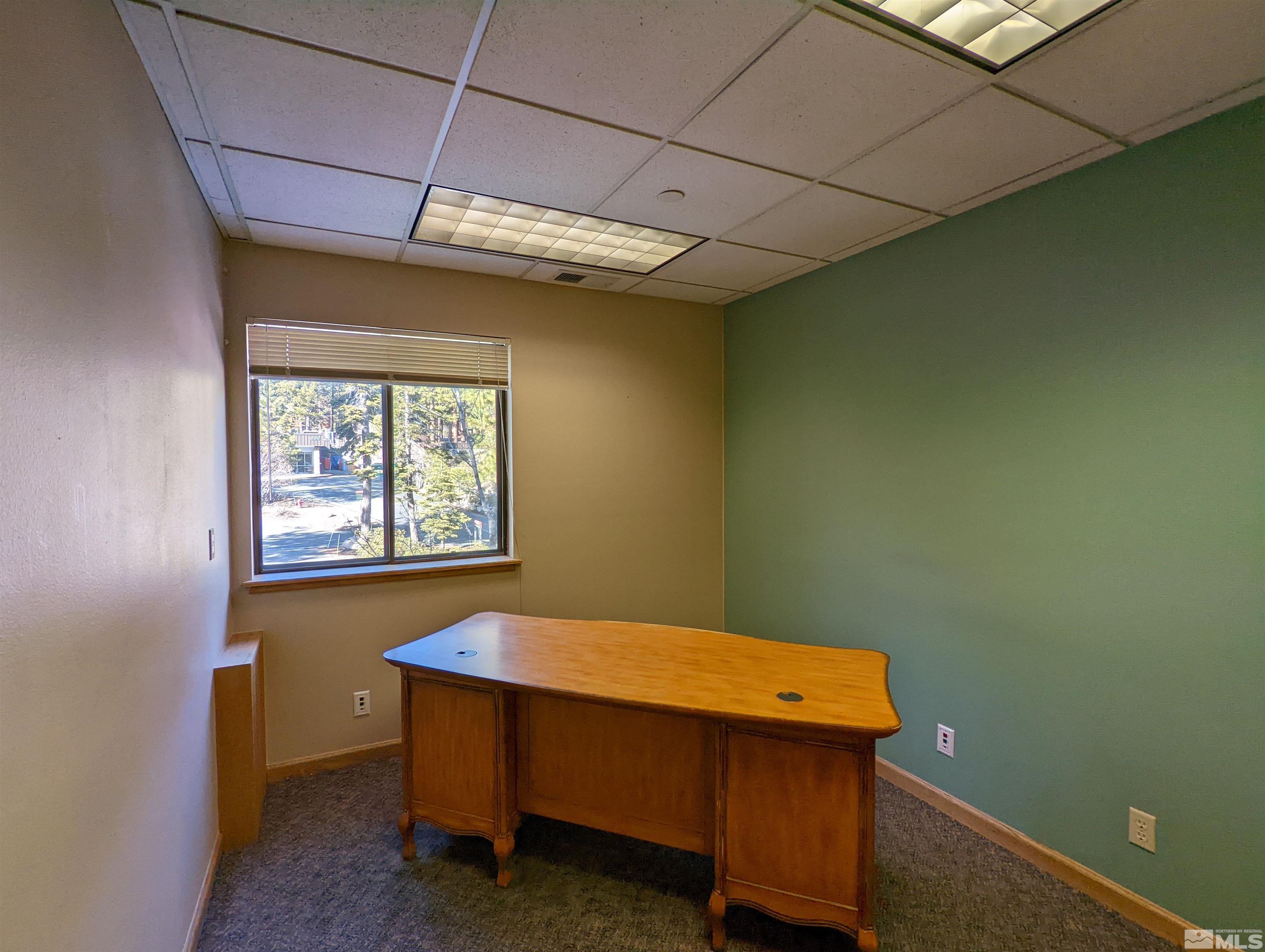 889 Alder Avenue, Unit 301 Incline Village, NV 89451 - Photo 19 of 23 a balcony with table and window