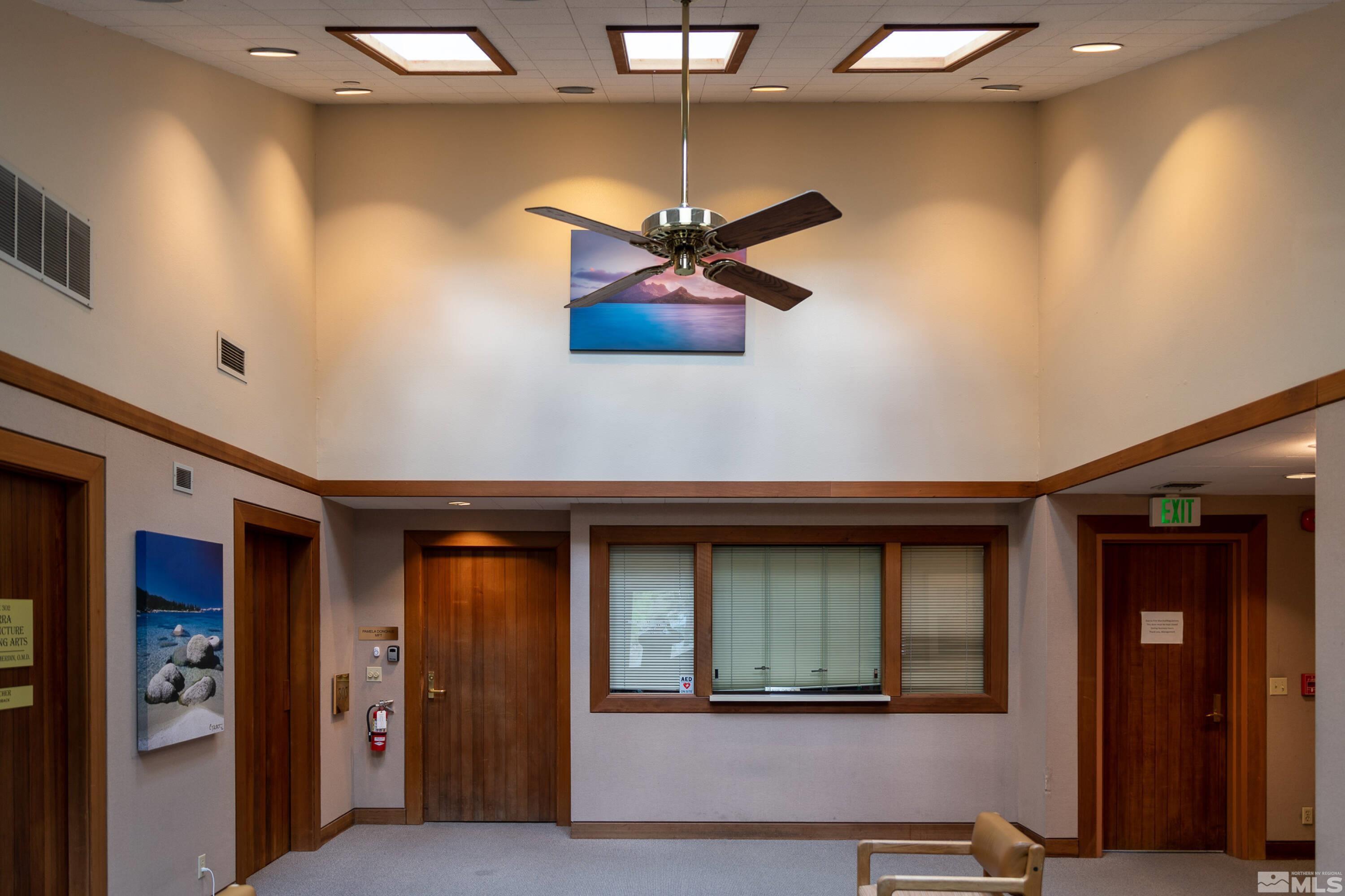 889 Alder Avenue, Unit 301 Incline Village, NV 89451 - Photo 7 of 23 a living room with furniture and a ceiling fan