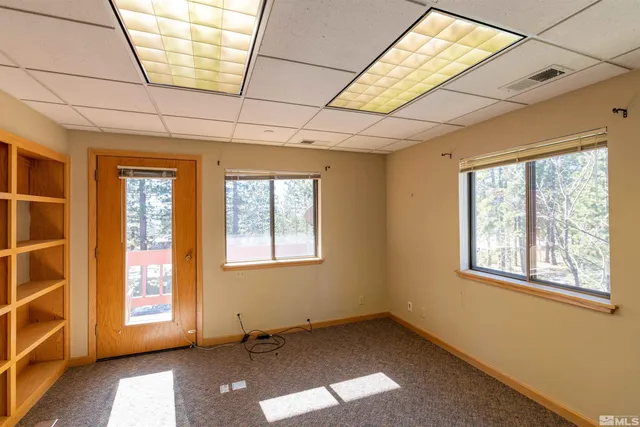 an empty room with windows