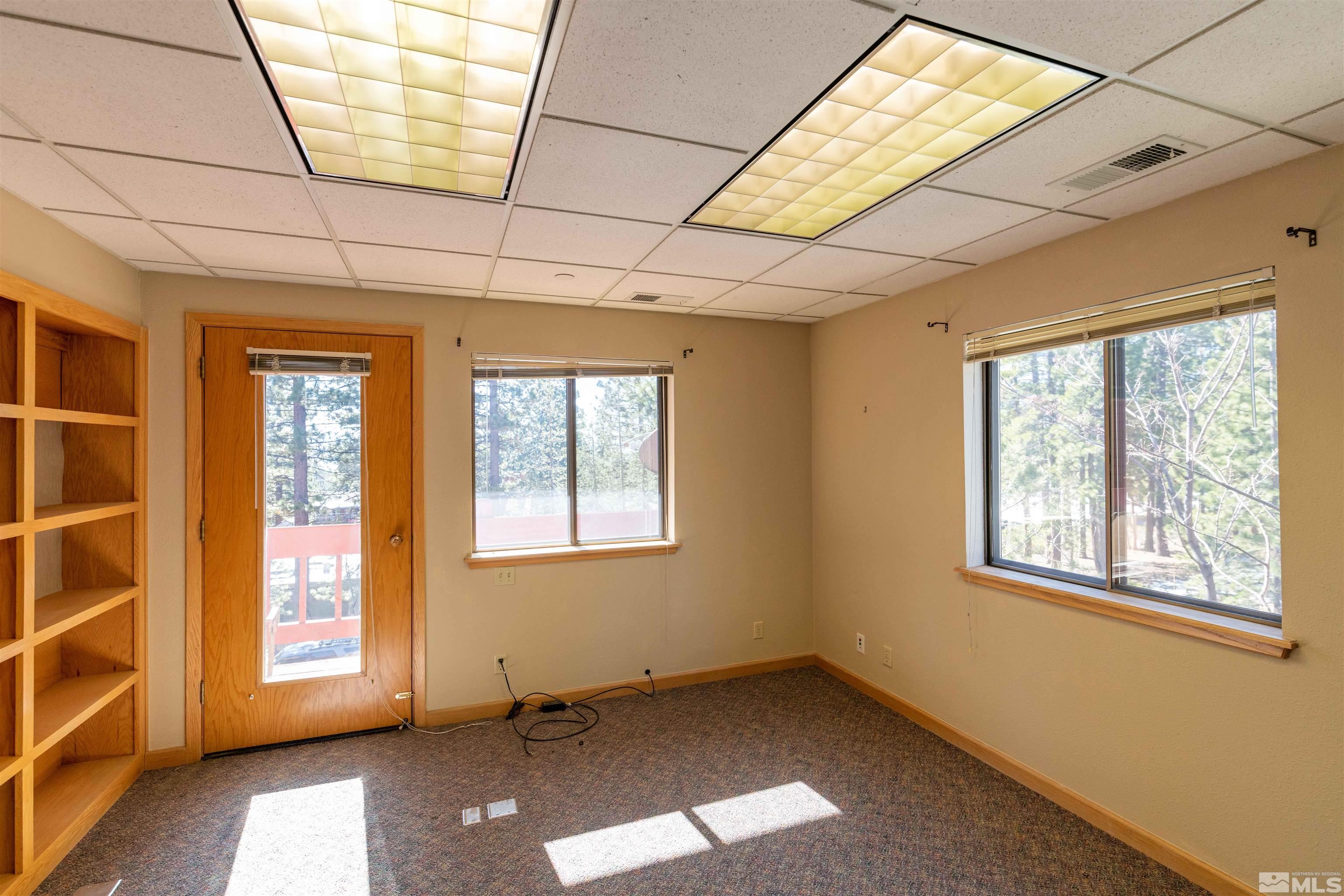 889 Alder Avenue, Unit 301 Incline Village, NV 89451 - Photo 10 of 23 an empty room with windows