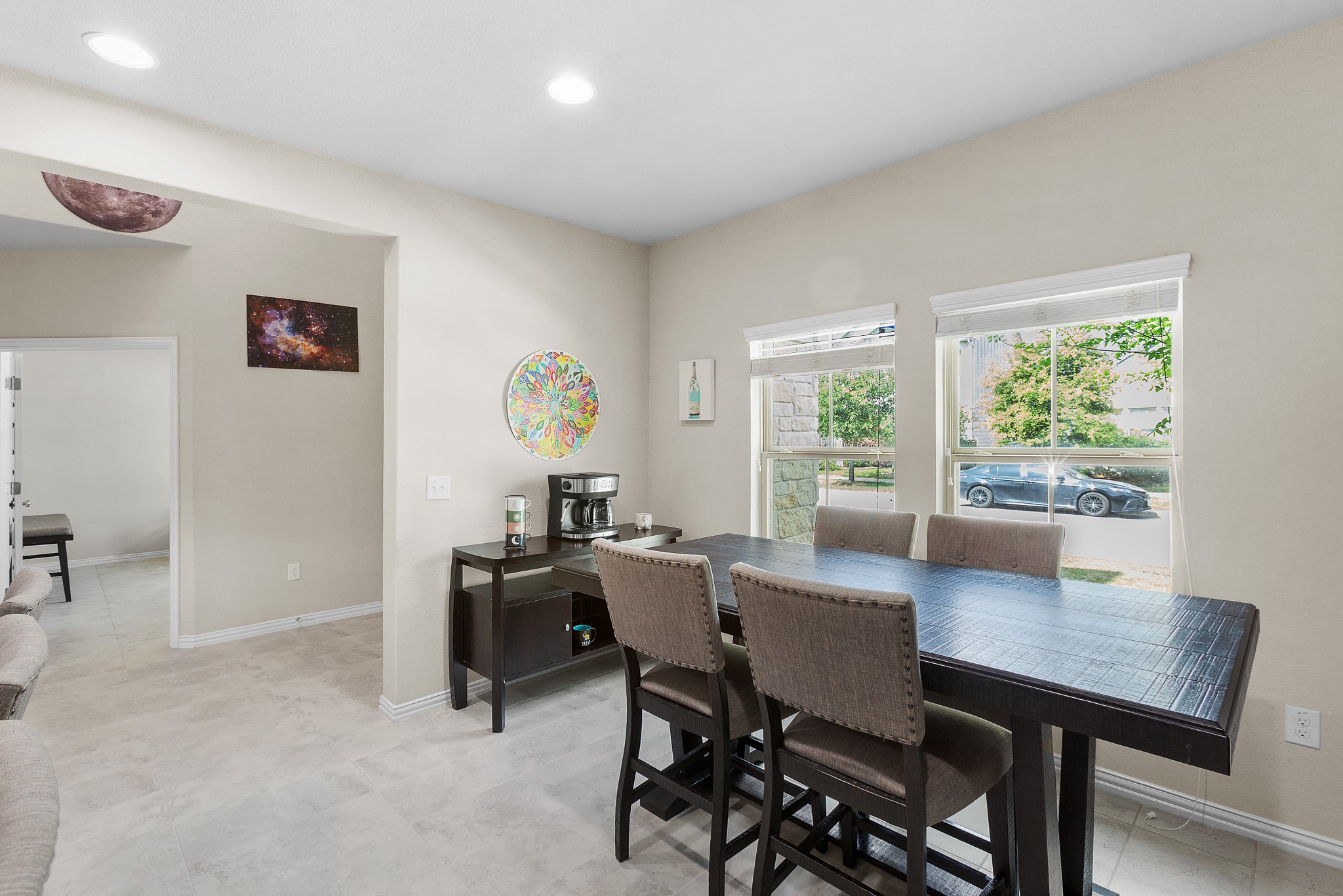 8709 Slater Drive Austin, TX 78747 - Photo 9 of 36 a view of a dining room with a table and chairs