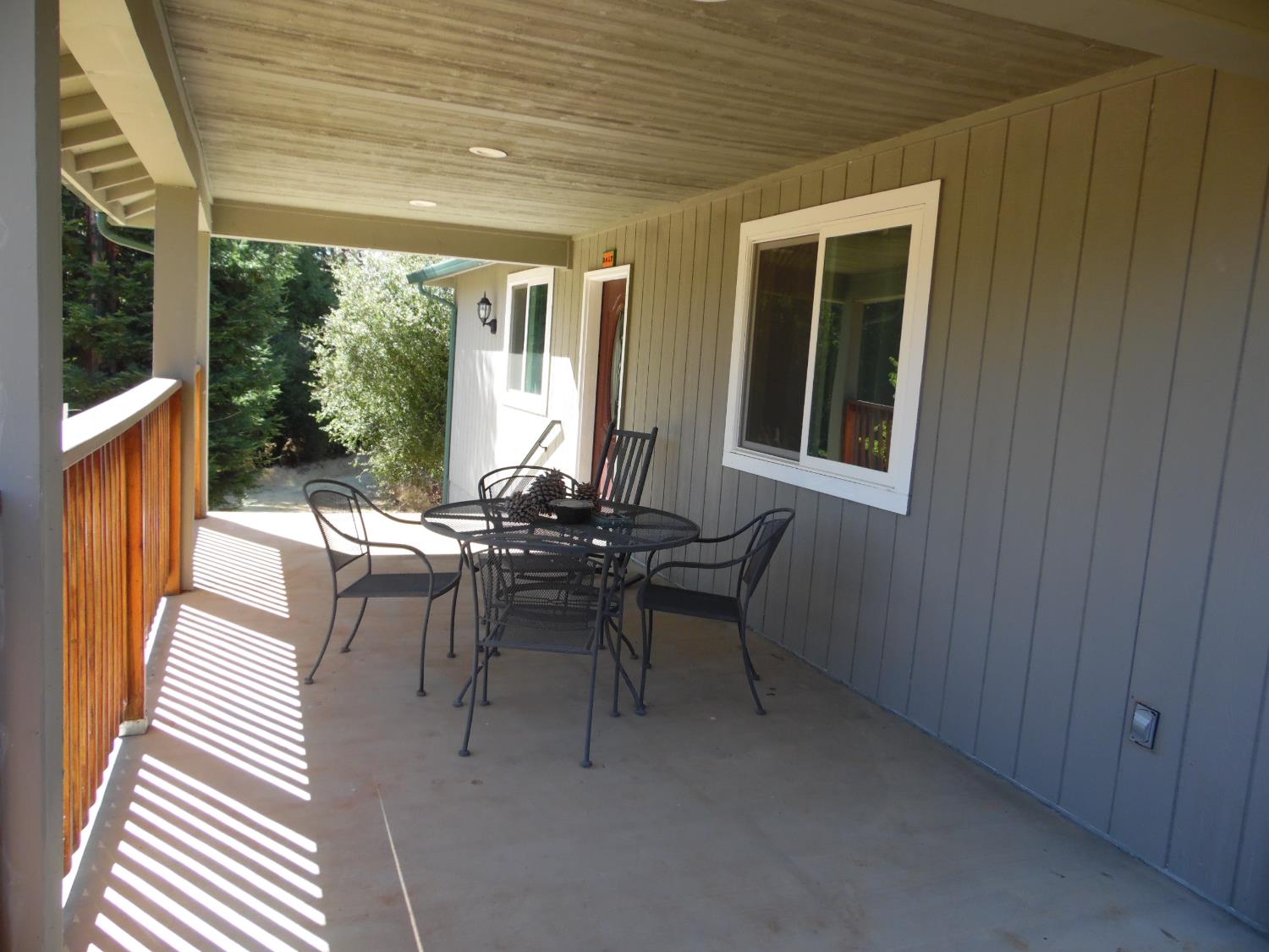 10006 Wendell Road Mountain Ranch, CA 95246 - Photo 19 of 37 a view of a dining room with furniture window and outside view