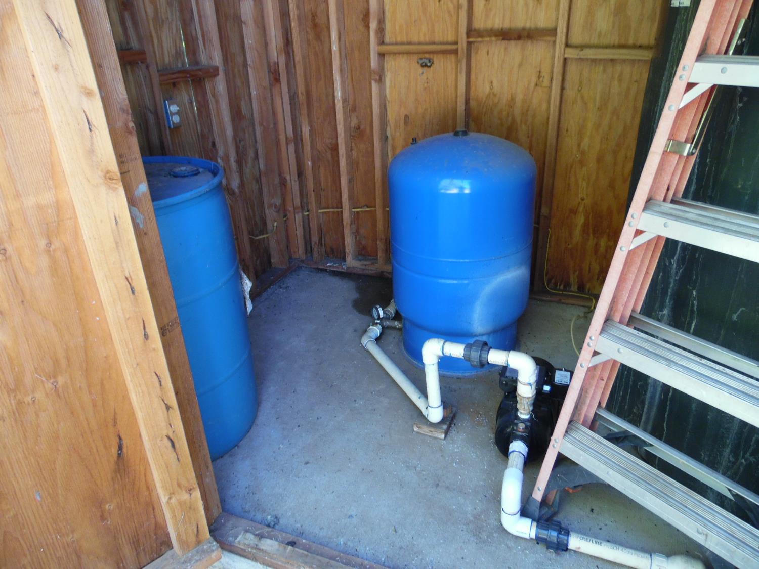 10006 Wendell Road Mountain Ranch, CA 95246 - Photo 36 of 37 a view of a room with wooden floor and windows