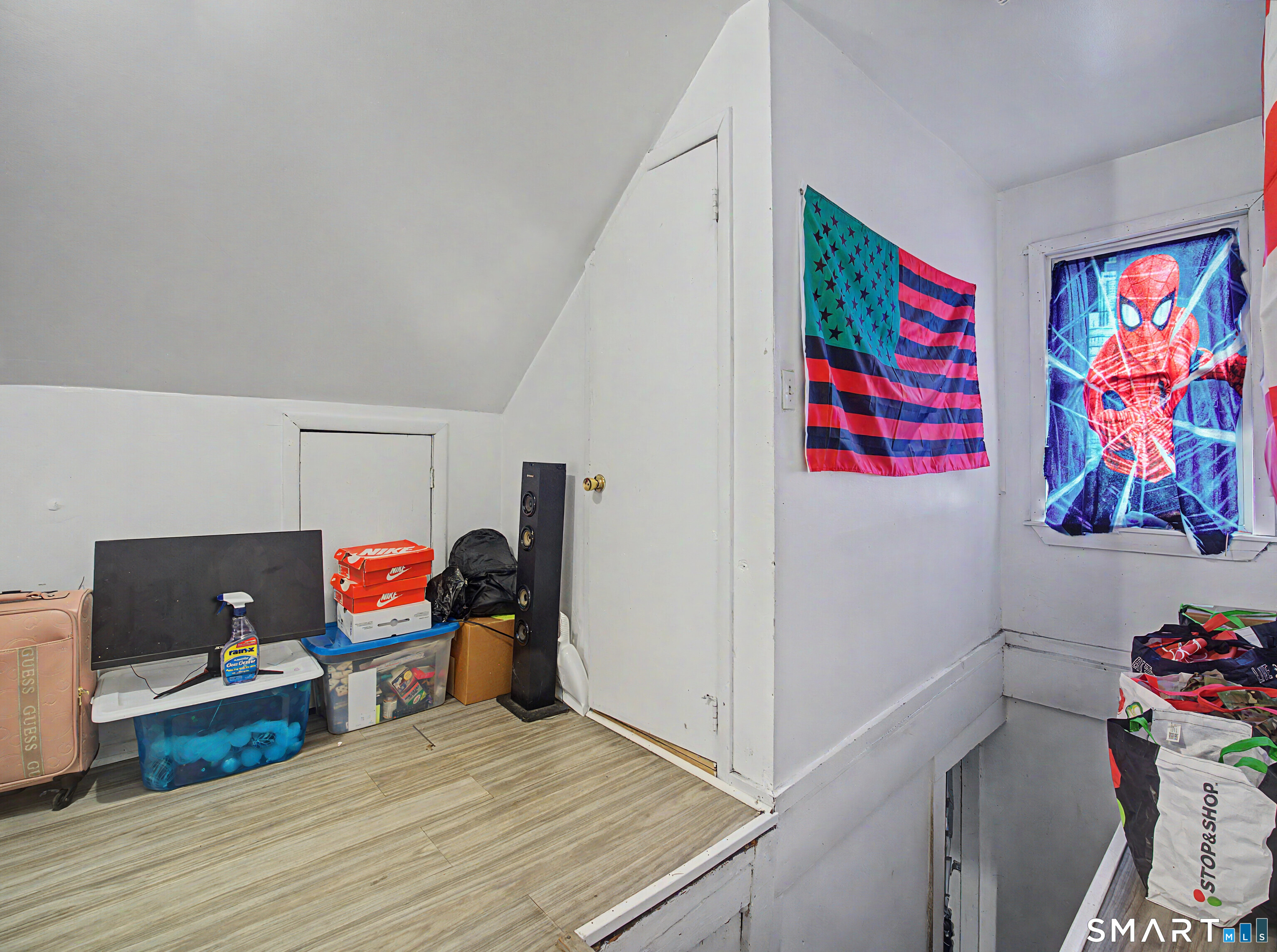 319 Carroll Avenue Bridgeport, CT 06607 - Photo 28 of 40 a view of a workspace with furniture and toys