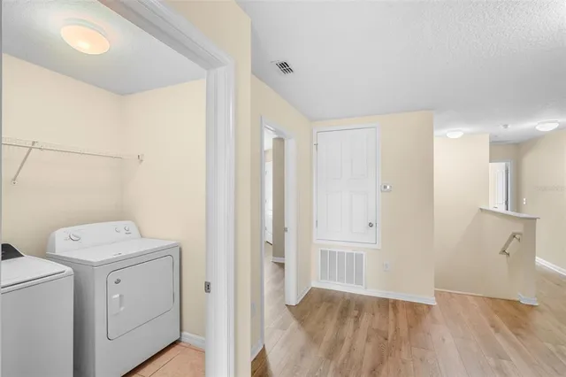 a view of utility room with washer and dryer