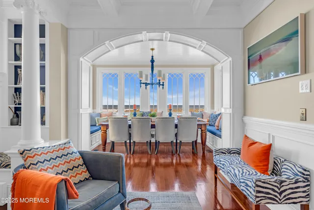 a bedroom with a large bed and a large window