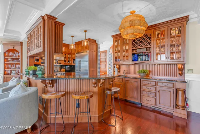 a living room with fireplace furniture and a flat screen tv
