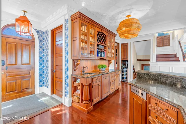 a front view of a house with a ocean view