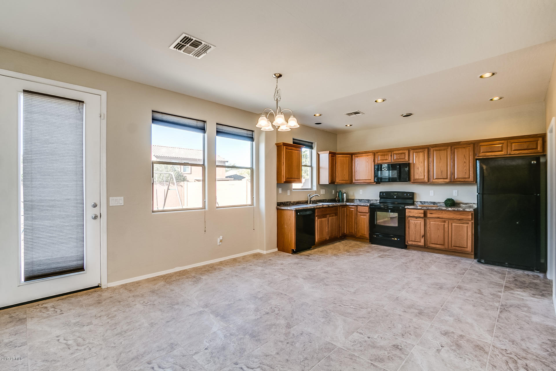 3308 West Apollo Road Phoenix, AZ 85041 - Photo 31 of 38 KITCHEN & EATING AREA 1