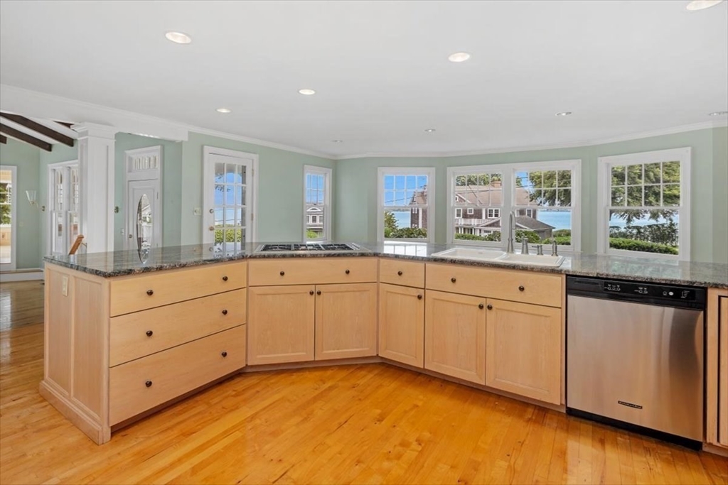 26 Bel Air Road Hingham, MA 02043 - Photo 16 of 41 a spacious bathroom with a granite countertop sink mirror and window