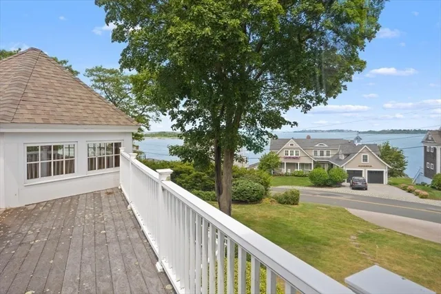 a view of an empty room with windows