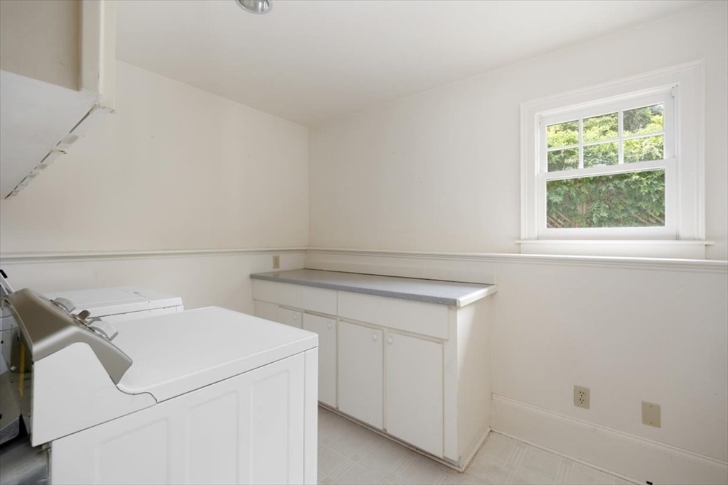 26 Bel Air Road Hingham, MA 02043 - Photo 33 of 40 a utility room with dryer and washer
