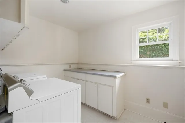 a view of a house with a fireplace and workspace