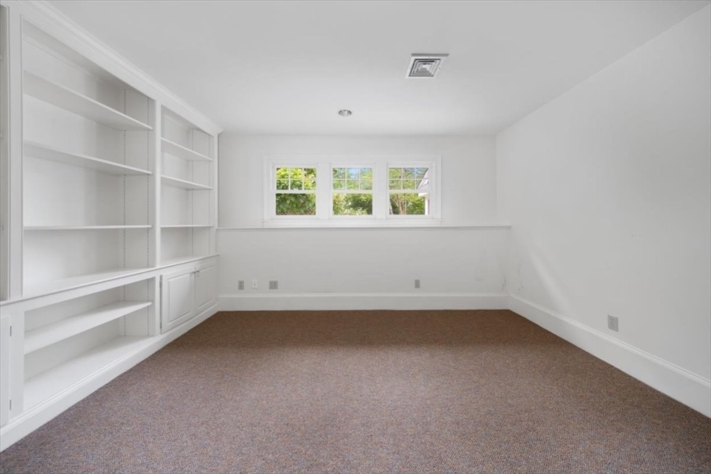 26 Bel Air Road Hingham, MA 02043 - Photo 36 of 40 a view of a room that has a small window
