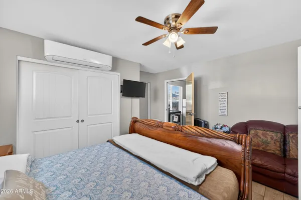 a bathroom with a double vanity sink and mirror