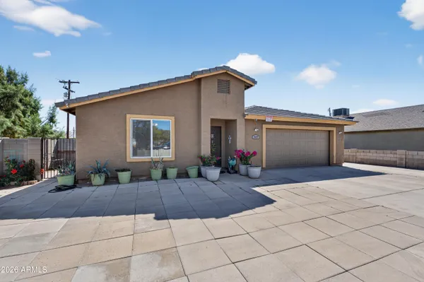 a backyard of a house with seating space