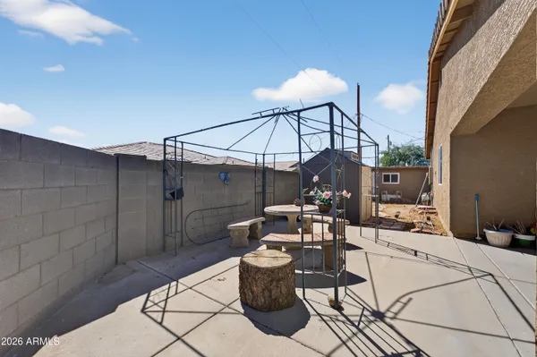 a house view with a backyard space