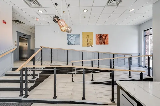 a view of entryway and kitchen
