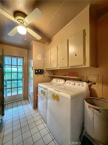 a utility room with washer and dryer